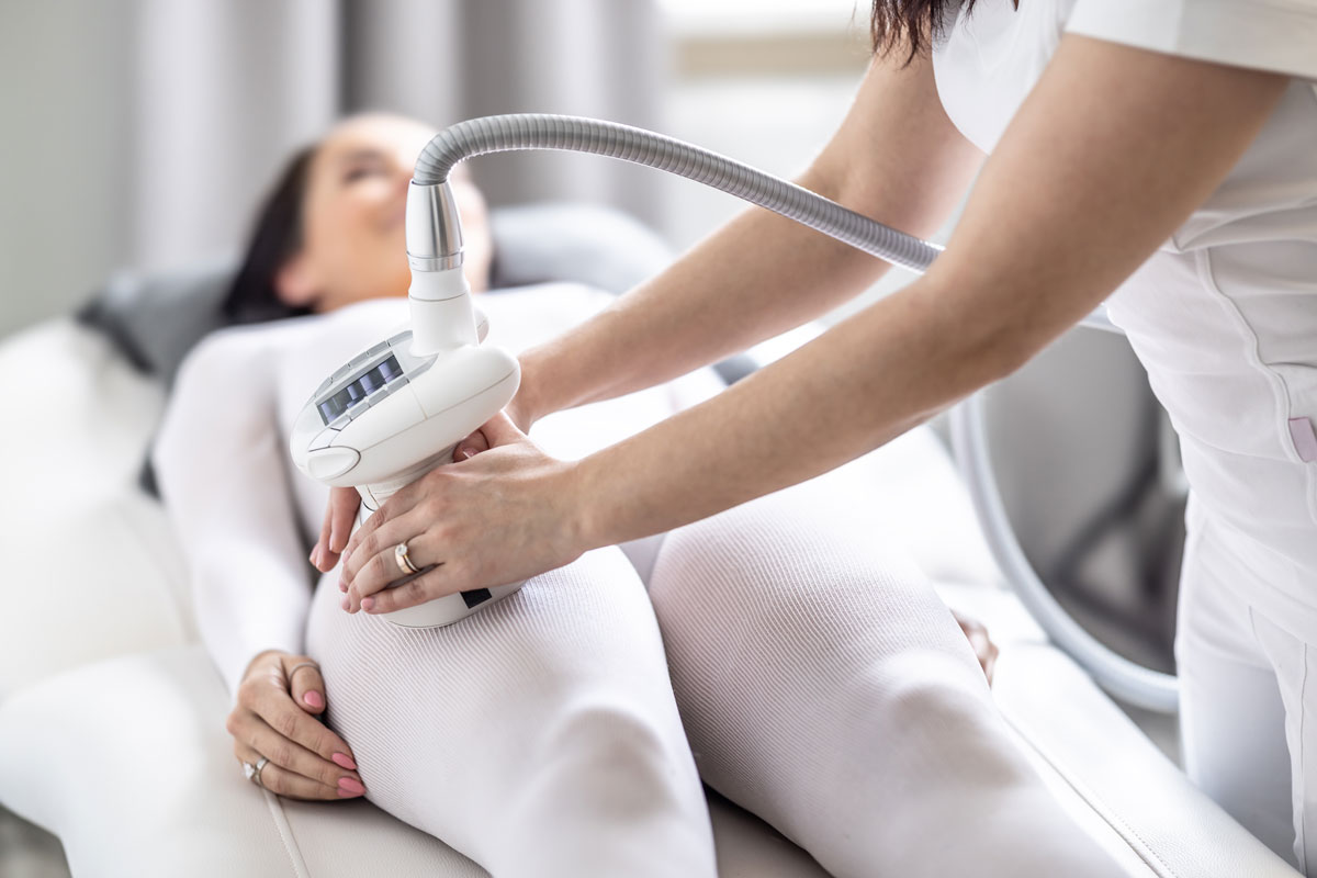 Woman getting cellulite treatment for her thighs